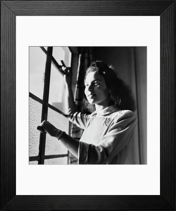 Framed Print : Tiger Bay. A woman looking out of a window at home in Tiger Bay or Bute Town Framed Print : Tiger Bay. A woman looking out of a window at home in Tiger Bay or Bute Town
