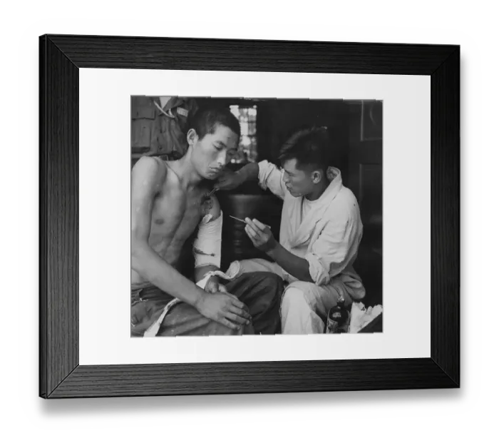 Framed Print : Wounded Korean POW Framed Print : Wounded Korean POW