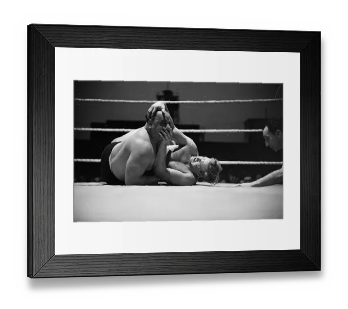 Framed Print : Nose Hold. 30th July 1949: American wrester Roy McLarty tries grabbing Bert Assirati Framed Print : Nose Hold. 30th July 1949: American wrester Roy McLarty tries grabbing Bert Assirati