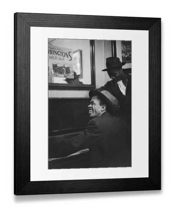 Framed Print : Pub Fun. A man play the piano as another chats with him at a pub, UK, 1949 Framed Print : Pub Fun. A man play the piano as another chats with him at a pub, UK, 1949