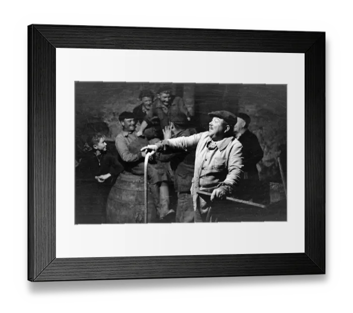 Framed Print : Wine Song. 18th December 1948: A peasant farmer rounds off his day with Framed Print : Wine Song. 18th December 1948: A peasant farmer rounds off his day with