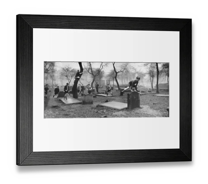Framed Print : Leap-Frog. A group of boys from the Gorbals play amongst the gravestones Framed Print : Leap-Frog. A group of boys from the Gorbals play amongst the gravestones