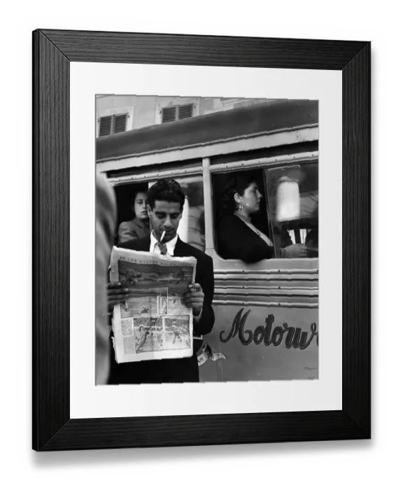 Framed Print : Gibraltar. 8th May 1944: A man reading a newspaper in the street in Gibraltar Framed Print : Gibraltar. 8th May 1944: A man reading a newspaper in the street in Gibraltar