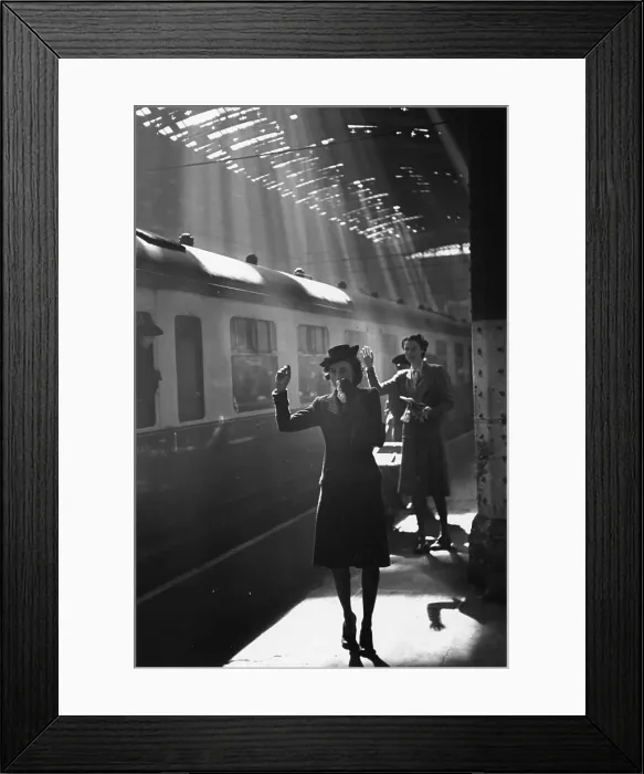 Framed Print : Goodbye. Tearful wives waving goodbye as a troop train pulls out of a station Framed Print : Goodbye. Tearful wives waving goodbye as a troop train pulls out of a station