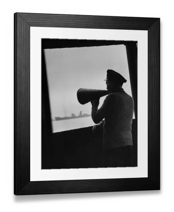 Framed Print : Lightship. May 1941: A sailor on a lightship uses a megaphone to broadcast Framed Print : Lightship. May 1941: A sailor on a lightship uses a megaphone to broadcast