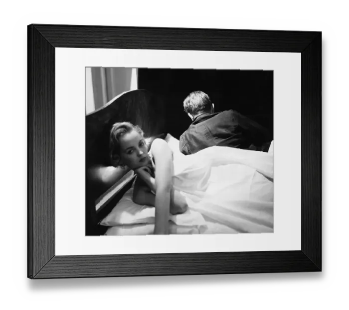 Framed Print : Lost Love. 30th October 1954: A couple in a failed marriage lie back to back on their bed Framed Print : Lost Love. 30th October 1954: A couple in a failed marriage lie back to back on their bed