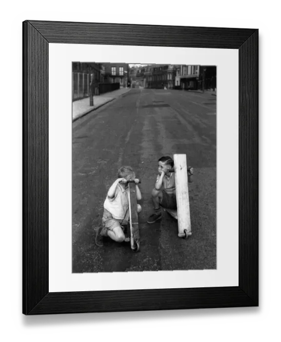 Framed Print : Race You. 7th August 1954: Two little boys playing in a London street with