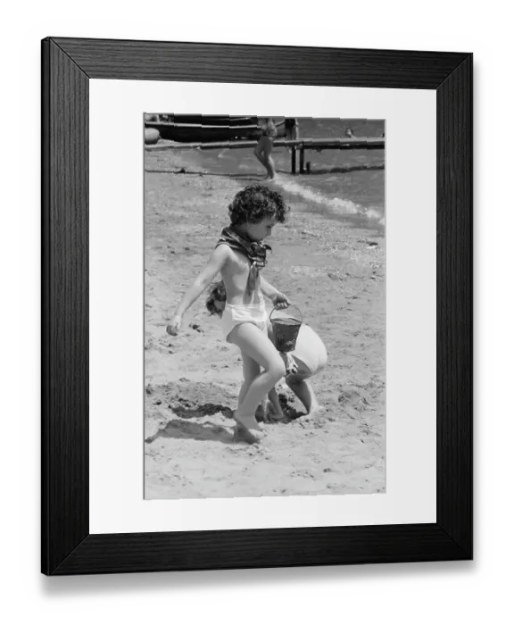 Framed Print : Portofino. Children playing on Paraggi Beach near the tourist resort of Portofino Framed Print : Portofino. Children playing on Paraggi Beach near the tourist resort of Portofino