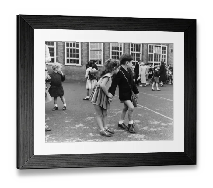 Framed Print : First Day. 15th October 1955: Two young children hold hands Framed Print : First Day. 15th October 1955: Two young children hold hands