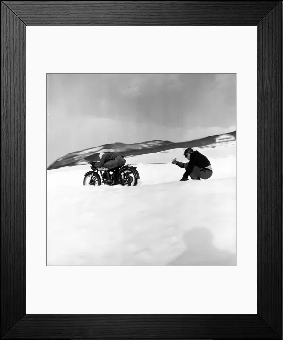 Framed Print : Ski Pull. 28th February 1953: A skier being towed by a motorbike at the Framed Print : Ski Pull. 28th February 1953: A skier being towed by a motorbike at the