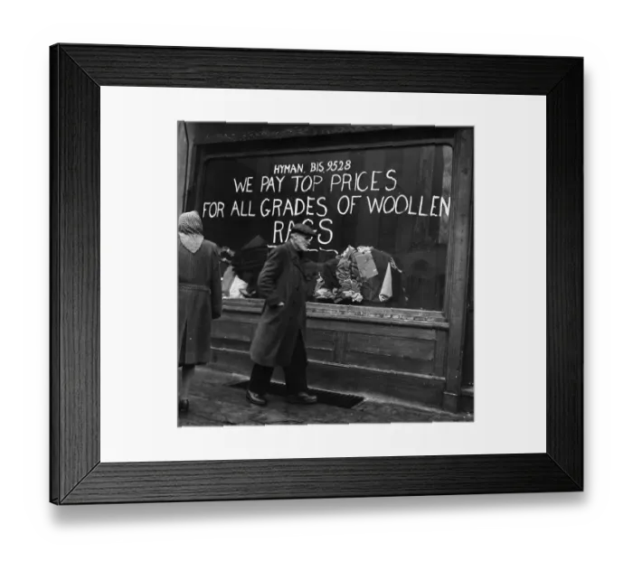 Framed Print : Rag Shop. An elderly man walks past a shop window announcing we pay top Framed Print : Rag Shop. An elderly man walks past a shop window announcing we pay top