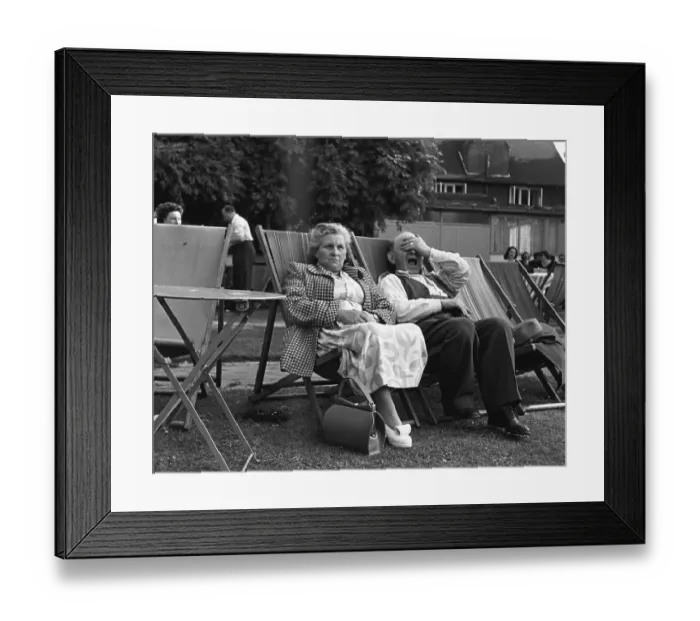 Framed Print : Park Yawn. 1951: A couple relaxing in the park Framed Print : Park Yawn. 1951: A couple relaxing in the park