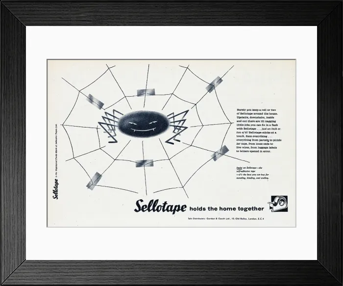 Framed Print : Sellotape. 1957: A spider sits in the middle of a cobweb that has been Framed Print : Sellotape. 1957: A spider sits in the middle of a cobweb that has been