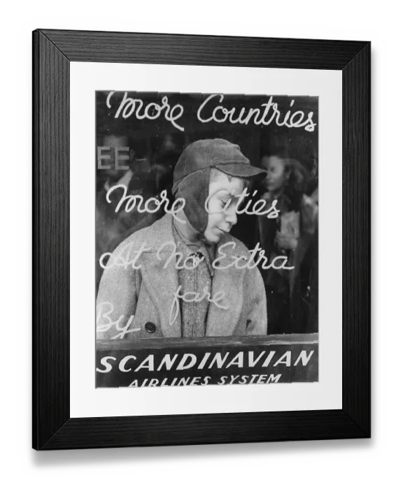 Framed Print : Refugee. An Egyptian Jewish refugee standing behind a sign advertising Framed Print : Refugee. An Egyptian Jewish refugee standing behind a sign advertising