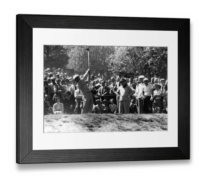 Framed Print : Ben Hogan. American golfer Ben Hogan plays a tee shot as the gallery looks Framed Print : Ben Hogan. American golfer Ben Hogan plays a tee shot as the gallery looks