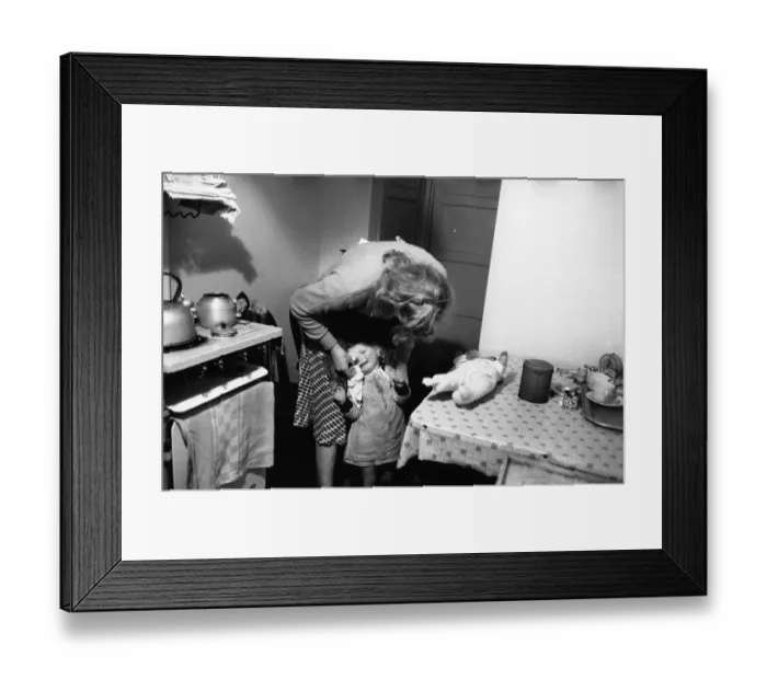 Framed Print : Tea Time. 10th March 1956: Annie Driver of Norfolk wipes her child's face before teatime Framed Print : Tea Time. 10th March 1956: Annie Driver of Norfolk wipes her child's face before teatime