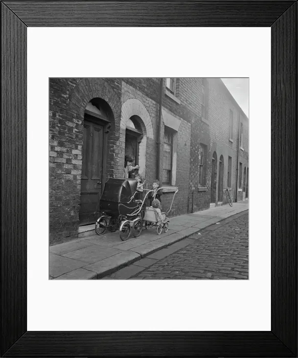 Framed Print : A Family Outside their Home In Salford Framed Print : A Family Outside their Home In Salford