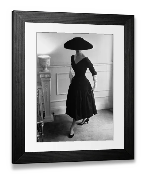 Framed Print : New Look. A model wearing a black cocktail dress Framed Print : New Look. A model wearing a black cocktail dress