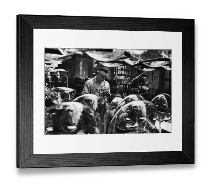 Framed Print : TV Tubes. A man works on the manufacture of television tubes Framed Print : TV Tubes. A man works on the manufacture of television tubes