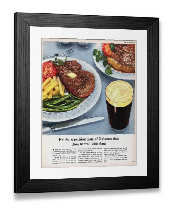 Framed Print : Guinness. 1955: Advertisement for Guinness showing a serving suggestion of steak Framed Print : Guinness. 1955: Advertisement for Guinness showing a serving suggestion of steak