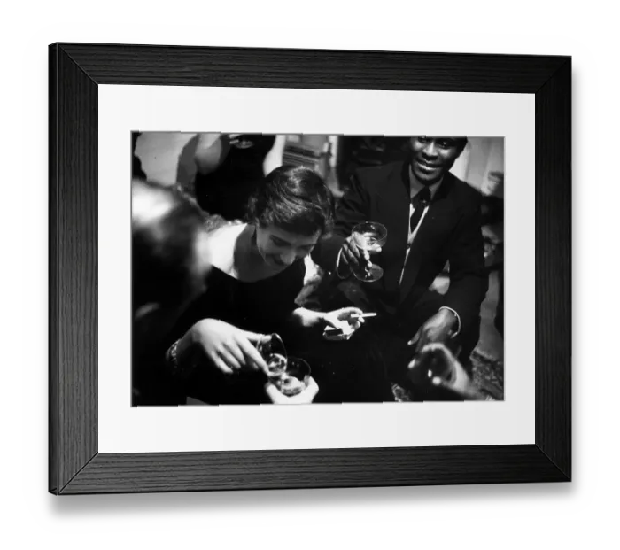 Framed Print : Hopeful. 26th February 1955: Patricia Farrier enjoys a drink and a smoke with friends Framed Print : Hopeful. 26th February 1955: Patricia Farrier enjoys a drink and a smoke with friends