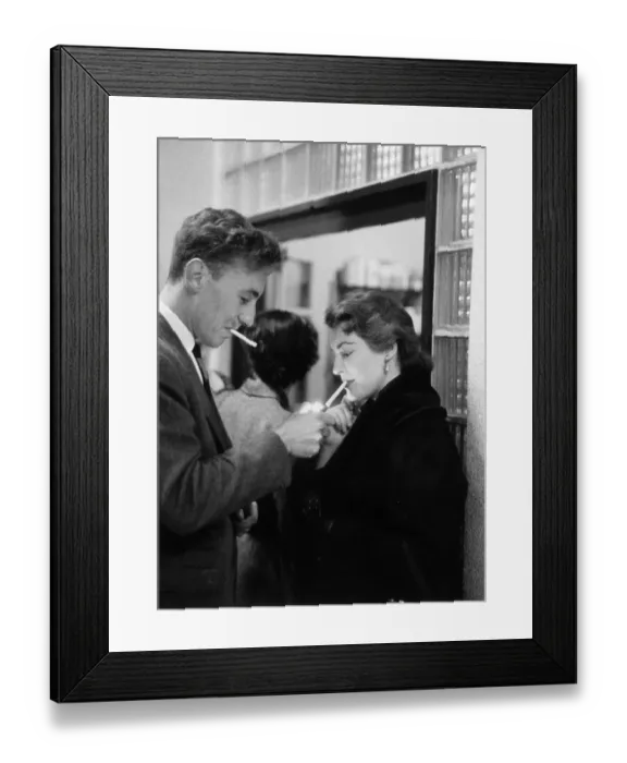 Framed Print : Chivalry. 5th February 1955: A naval officer lights Jean Lockwood's cigarette Framed Print : Chivalry. 5th February 1955: A naval officer lights Jean Lockwood's cigarette
