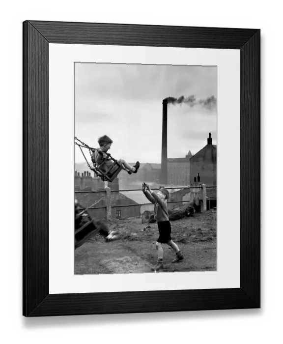 Framed Print : Playtime. May 1955: Children play outdoors within sight of the smoke Framed Print : Playtime. May 1955: Children play outdoors within sight of the smoke