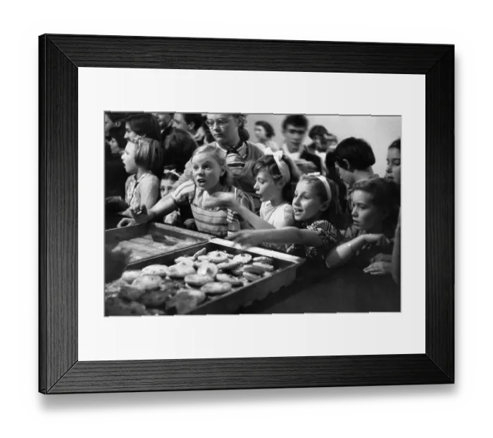 Framed Print : Tuck Shop. 4th December 1954: Hungry Children reaching for some cakes after Framed Print : Tuck Shop. 4th December 1954: Hungry Children reaching for some cakes after