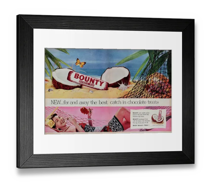 Framed Print : Bounty. 1954: Advertisement for Bounty showing a chocolate bar resting Framed Print : Bounty. 1954: Advertisement for Bounty showing a chocolate bar resting
