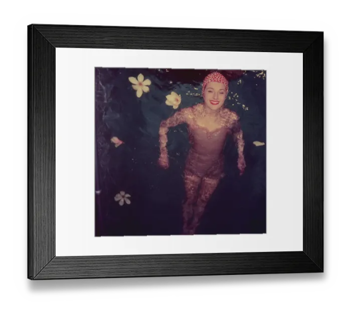 Framed Print : Swimwear. A woman modelling swimwear. Original Publication