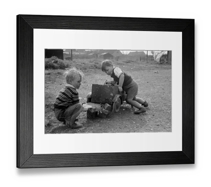 Framed Print : Cart MOT. 29th May 1954: Children playing with their cart in a poor area of Bristol Framed Print : Cart MOT. 29th May 1954: Children playing with their cart in a poor area of Bristol