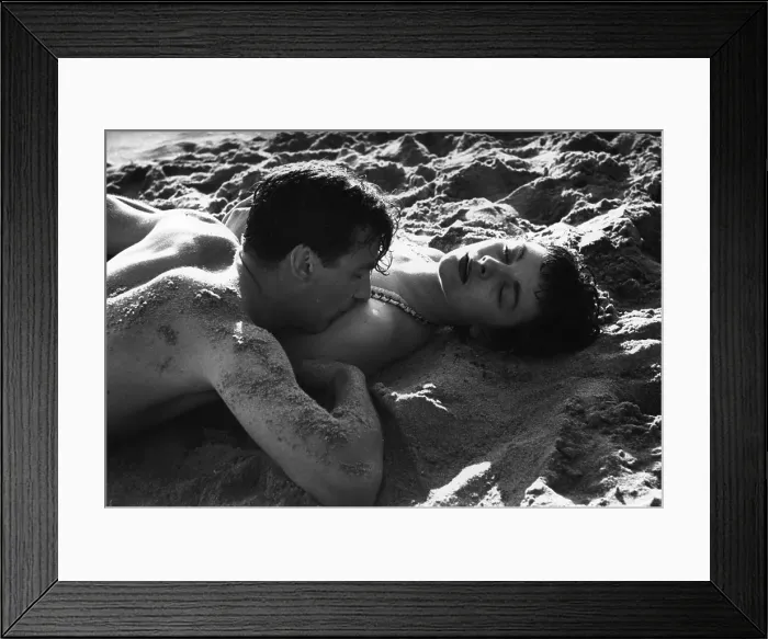 Framed Print : Honeymoon. A couple lying on a beach in the South of France Framed Print : Honeymoon. A couple lying on a beach in the South of France