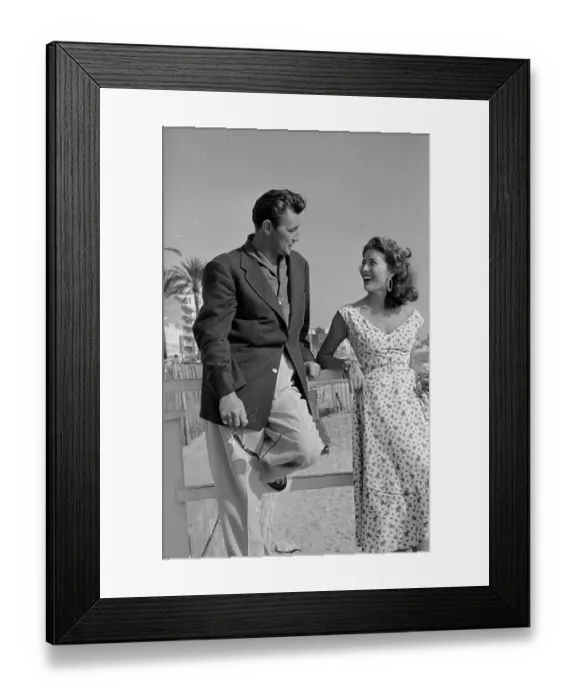 Framed Print : Mitchum And Starlet Framed Print : Mitchum And Starlet