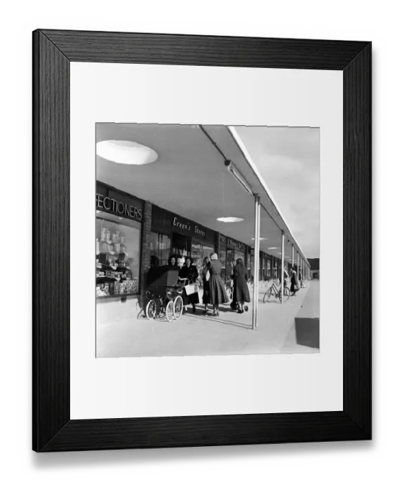 Framed Print : New Shops. 27th March 1954: A group of mothers meet in the shopping centre Framed Print : New Shops. 27th March 1954: A group of mothers meet in the shopping centre