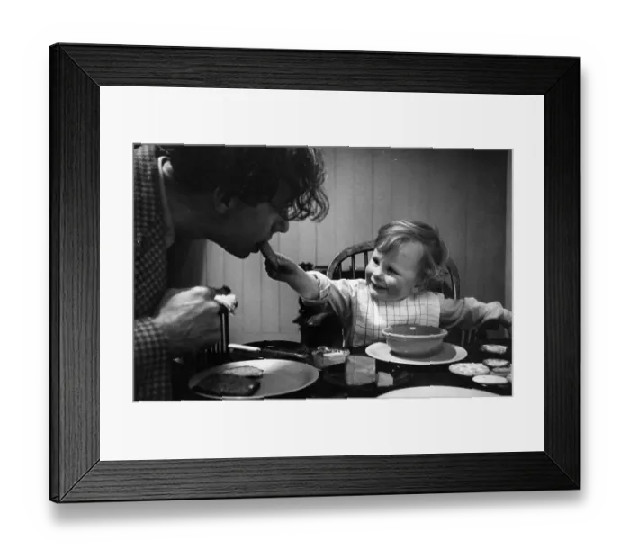 Framed Print : Feeding Father Framed Print : Feeding Father