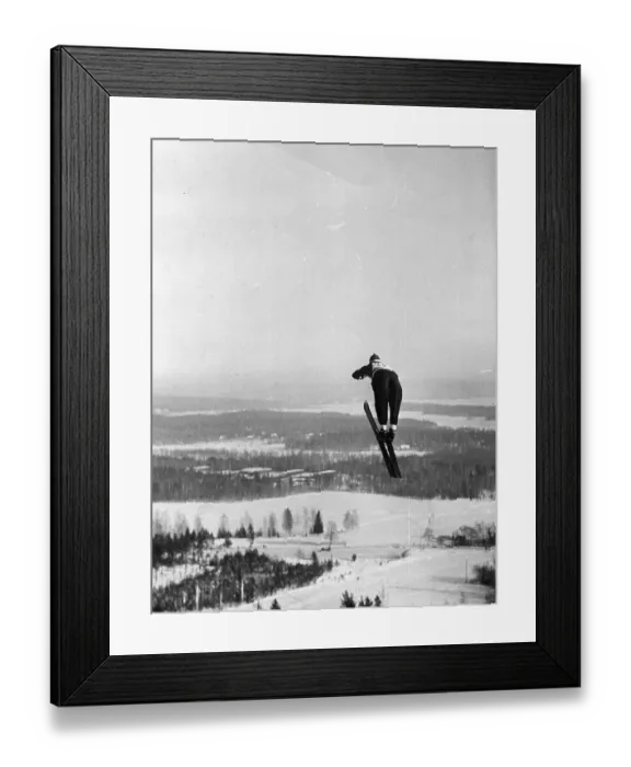 Framed Print : Ski Jump. A skier performing a ski-jump at the World Ski Championships in Falun Framed Print : Ski Jump. A skier performing a ski-jump at the World Ski Championships in Falun