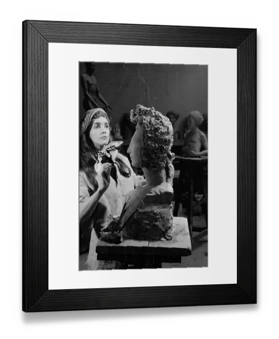 Framed Print : Scuptor. 23rd January 1954: A model poses as a sculptor for part of a series Framed Print : Scuptor. 23rd January 1954: A model poses as a sculptor for part of a series