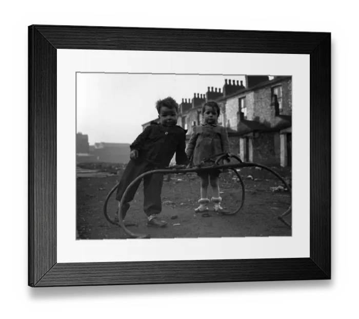 Framed Print : Slum Area. 16th January 1954: Children playing in the slum area of Hulme in Manchester Framed Print : Slum Area. 16th January 1954: Children playing in the slum area of Hulme in Manchester
