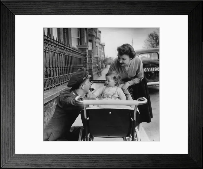 Framed Print : Hello Dad. 1954: An American serviceman stationed in Britain talking to Framed Print : Hello Dad. 1954: An American serviceman stationed in Britain talking to