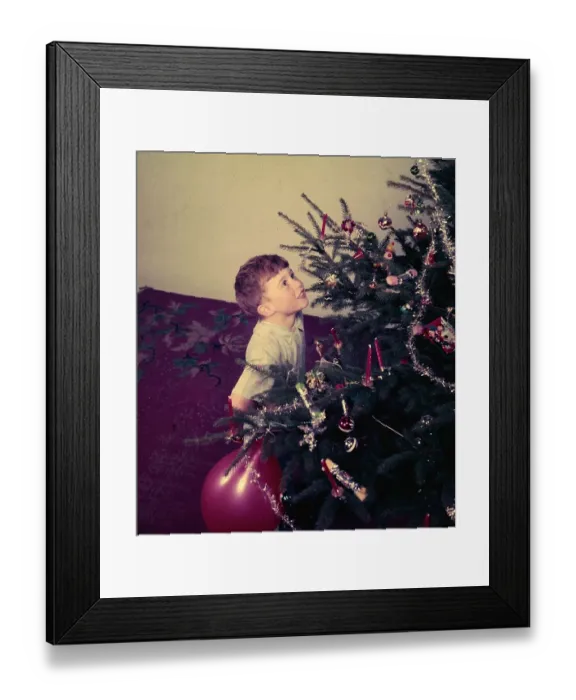Framed Print : Young Boy. 1954: A young boy looking at a christmas tree Framed Print : Young Boy. 1954: A young boy looking at a christmas tree