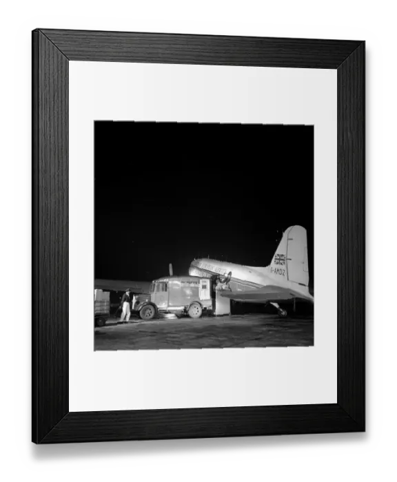 Framed Print : Loading The Plane