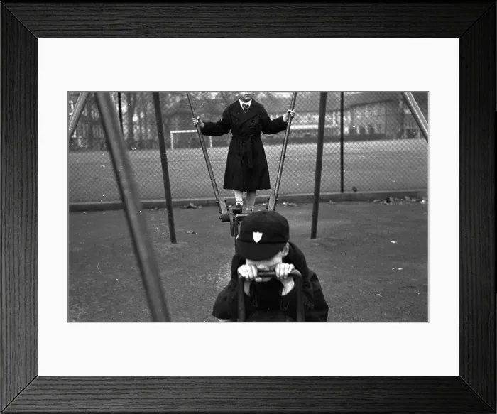 Framed Print : Swingboat. December 1953: Eugene De Freitas (background) Framed Print : Swingboat. December 1953: Eugene De Freitas (background)