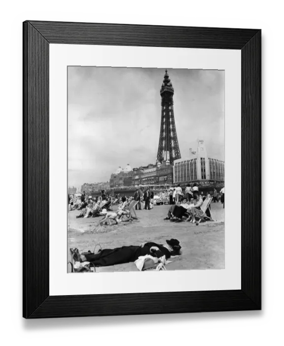 Framed Print : Beach Nap. 11th July 1953: A worn out holidaymaker taking a nap on the beach Framed Print : Beach Nap. 11th July 1953: A worn out holidaymaker taking a nap on the beach
