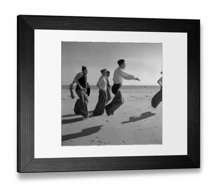 Framed Print : Sack Race. 25th April 1953: Newly wed couples honeymooning in Jersey enjoy Framed Print : Sack Race. 25th April 1953: Newly wed couples honeymooning in Jersey enjoy