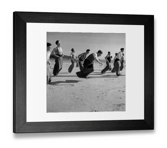 Framed Print : Sack Race. 25th April 1953: Newly wed couples honeymooning in Jersey enjoy Framed Print : Sack Race. 25th April 1953: Newly wed couples honeymooning in Jersey enjoy