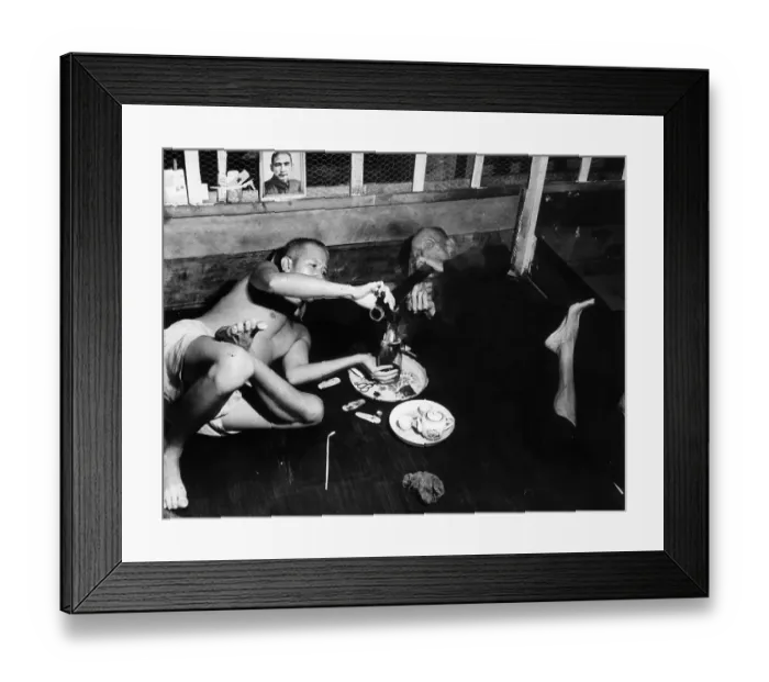 Framed Print : Opium Den. 28th March 1953: An opium den attendant Framed Print : Opium Den. 28th March 1953: An opium den attendant