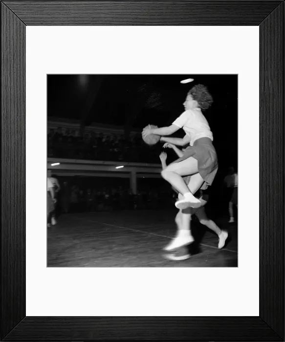 Framed Print : Ball Jump. 7th March 1953: A netball player jumping with the ball Framed Print : Ball Jump. 7th March 1953: A netball player jumping with the ball