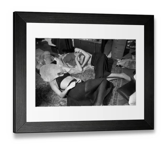 Framed Print : Cat Nap. 28th February 1953: Backstage, British models cover their faces Framed Print : Cat Nap. 28th February 1953: Backstage, British models cover their faces
