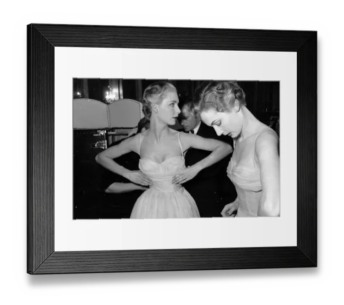 Framed Print : All Right. 28th February 1953: Backstage two British models check their Framed Print : All Right. 28th February 1953: Backstage two British models check their