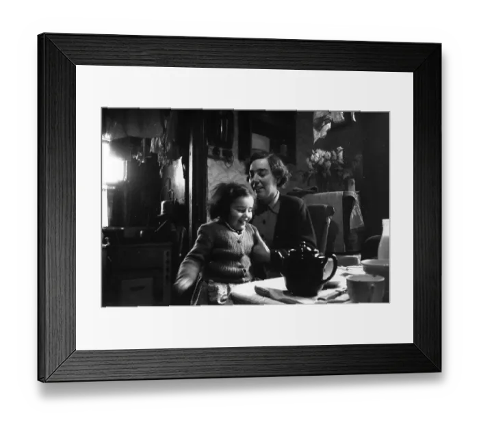 Framed Print : Tea Time. 27th December 1952: A wife and daughter wait for news of their Framed Print : Tea Time. 27th December 1952: A wife and daughter wait for news of their